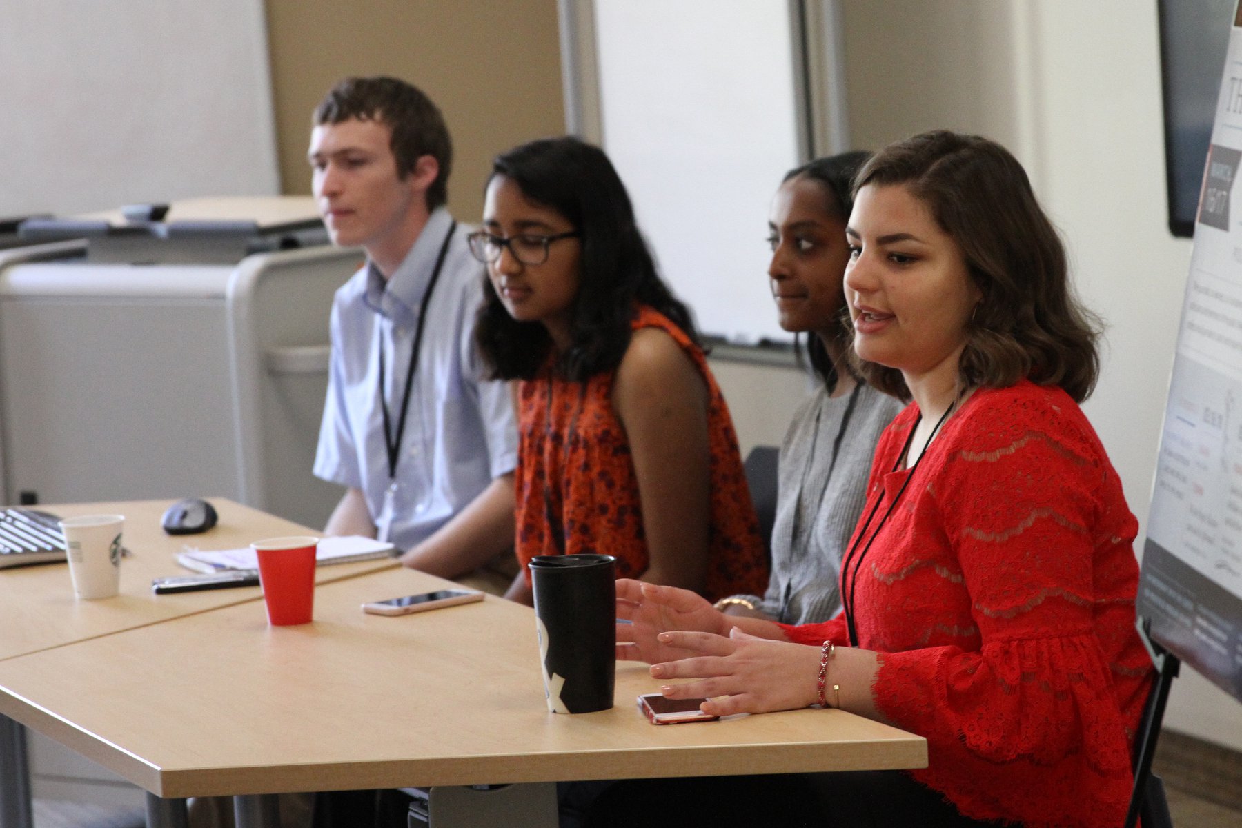 Students presenting their research at GUS 2023